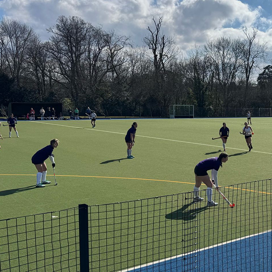 People playing hockey